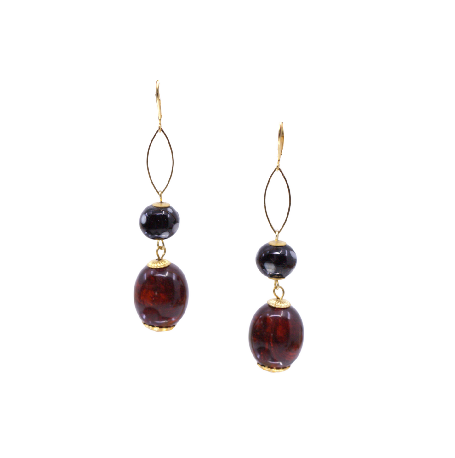 Pair of earrings with dark and amber beads on a white background