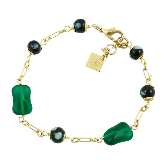 Gold-plated Esmeralda bracelet with green vintage glass beads and black Conta Di Ojo evil eye beads, handmade in New York by Alzerina