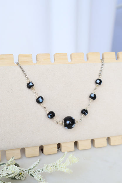 Maninha Necklace – Evil Eye Jewelry Honoring Love & Memory