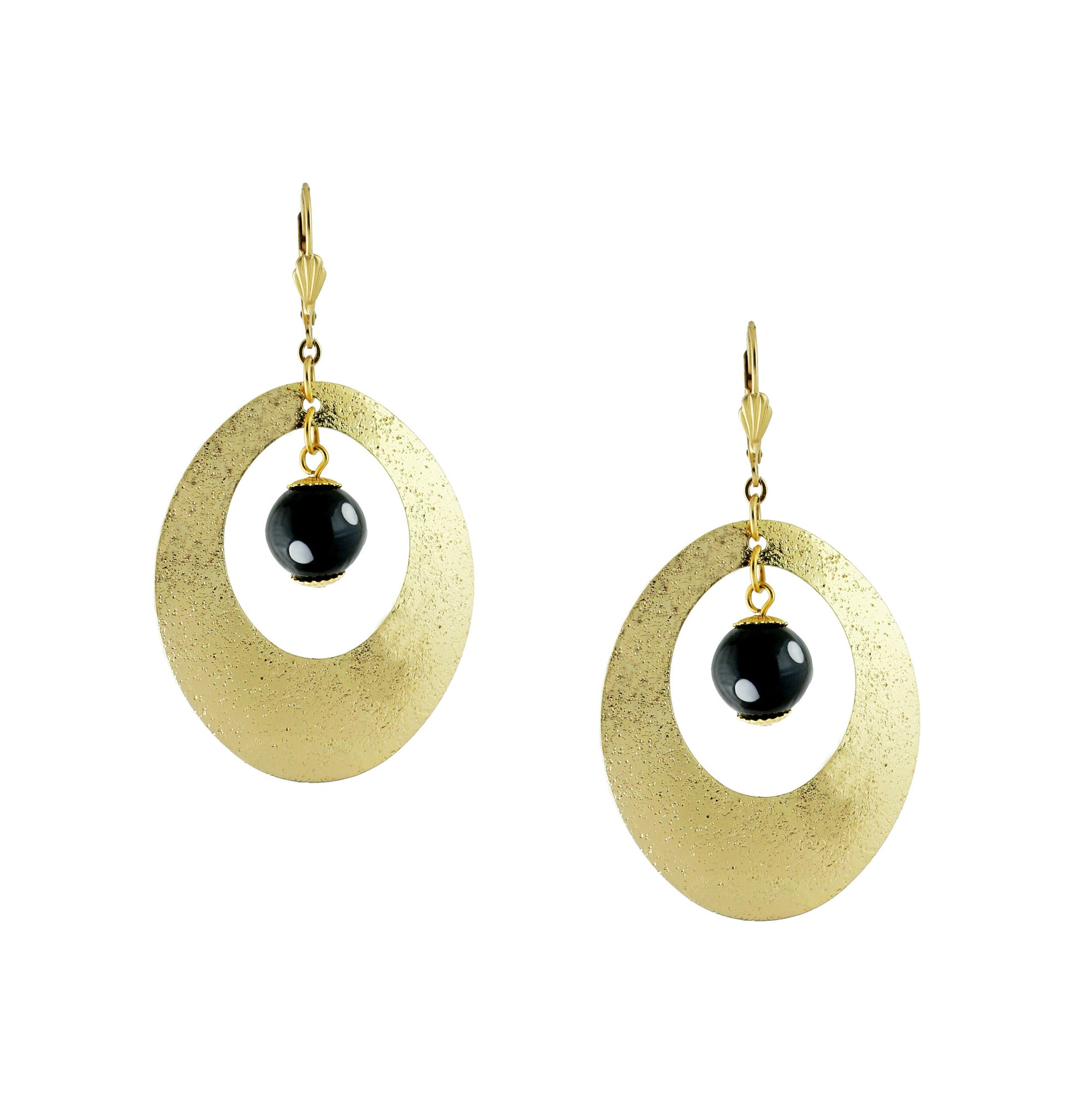 Gold hoop earrings with black Conta Di Ojo (evil eye) bead, handmade by Alzerina